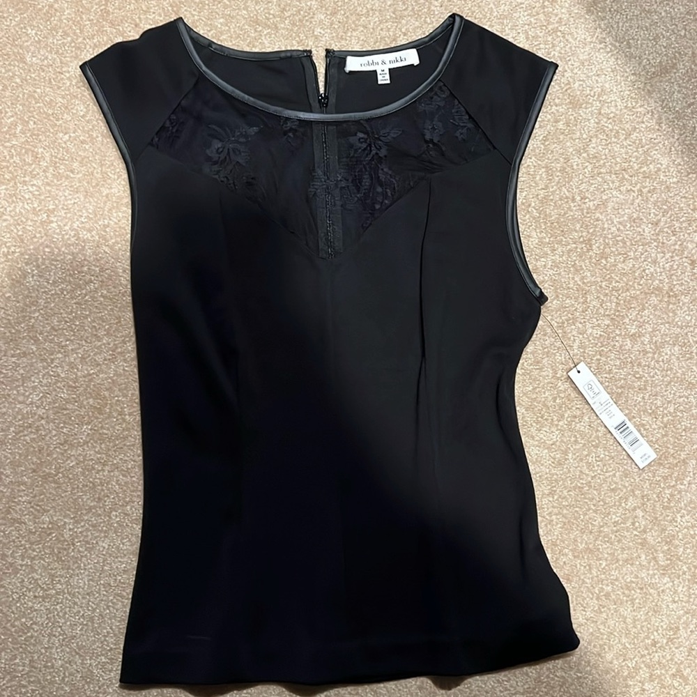 Black sleeveless top and lace detail